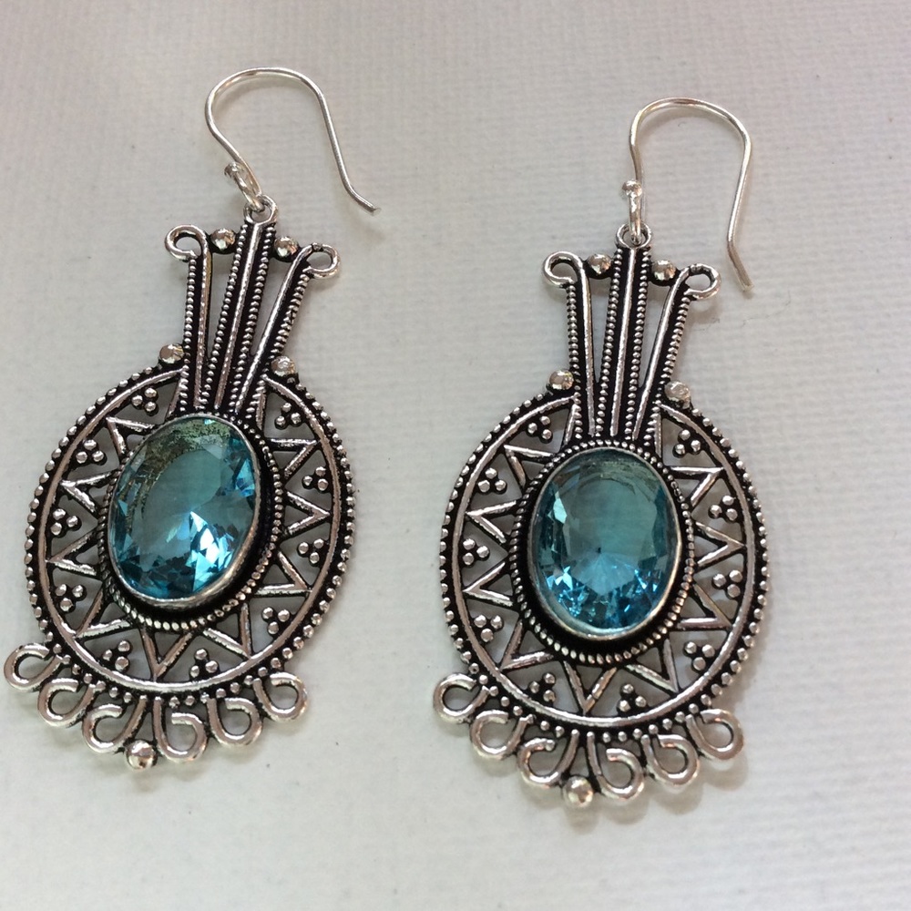 Sterling Silver Blue Topaz Dangle Oval Earrings